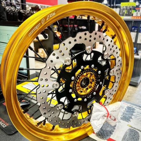 About Us 2 gold surron wheel