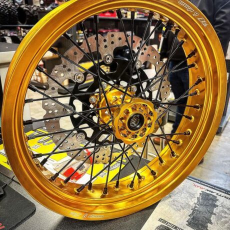About Us 3 surron gold wheel